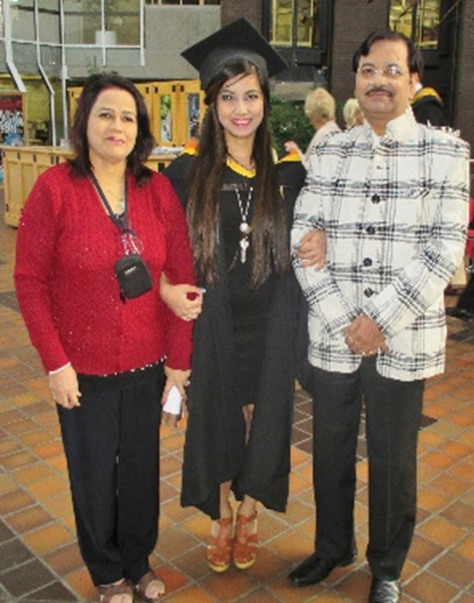 My parents proudly attended my graduation ceremony - received Doctorate degree.