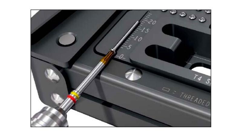 Variable Angle Locking Hand System screw placed on implant module scale