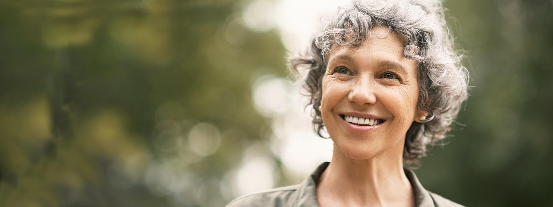 Grey-Haired middle-aged women smiling 